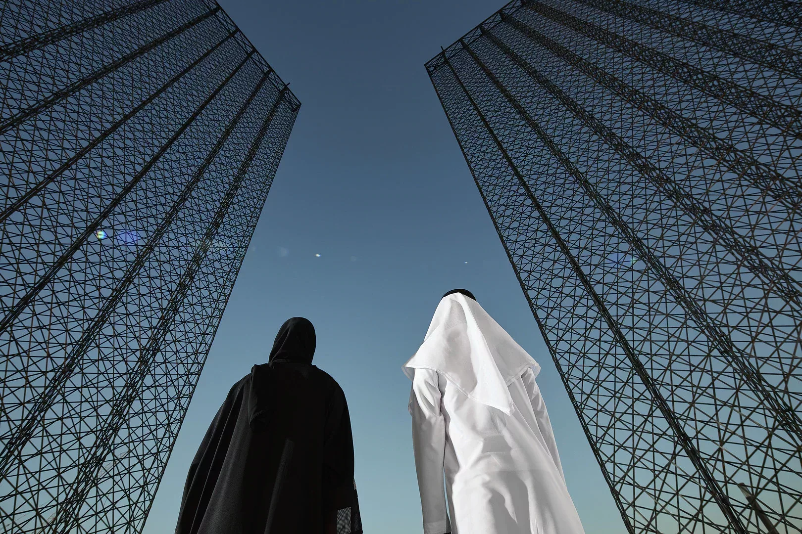Emirati couple staring at expo portal